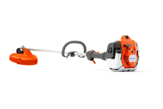 HUSQVARNA 525LX Débroussailleuse professionnelle. Vue latérale d’un coupe-bordures Husqvarna avec poignée et carter moteur ergonomiques.