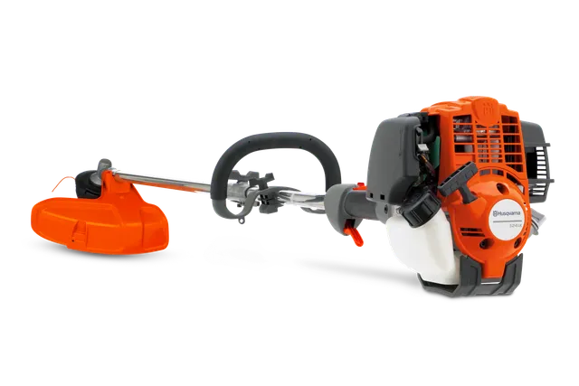 Vy från sidan av en röjsåg från Husqvarna med ergonomiskt handtag och skydd.