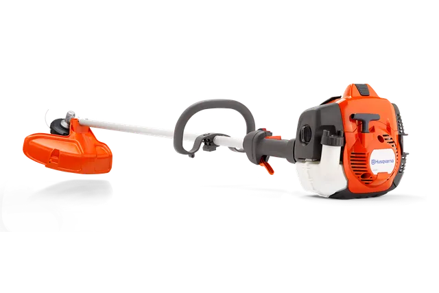 Side view of a Husqvarna brush cutter with ergonomic handle and engine.