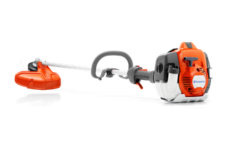 Side view of a Husqvarna brush cutter with ergonomic handle and cutting head.