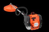 Side view of a Husqvarna brush cutter showing the engine and cutting head.