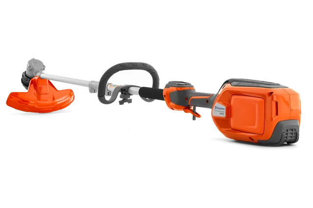Vue latérale d’une tondeuse à batterie Husqvarna mettant en valeur sa poignée ergonomique et sa tête de coupe.
