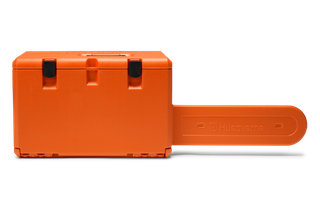 Side view of a Husqvarna chainsaw carrying case with a bar holder.