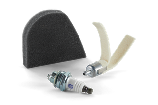 Studio image of a spark plug, air filter, and fuel filter, likely for a garden tool.