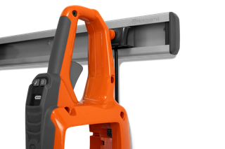 Side view of a Husqvarna product hanging on a wall-mounted rack.