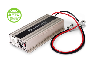 HUSQVARNA Inverter VI600F. Husqvarna power inverter with AC outlet and battery clamp cables, plus AGZA AFTC badge.