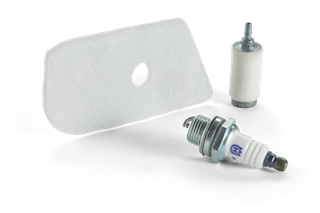 A spark plug, fuel filter, and air filter displayed in a studio setting.