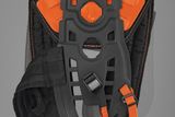 Front view of a harness with adjustable straps and padding.