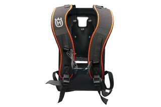 Rear view of a Husqvarna backpack harness with adjustable straps.