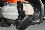 Close-up of a product showcasing its air filter compartment.