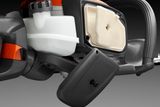 Close-up of a Husqvarna product showcasing its air filter and fuel tank.