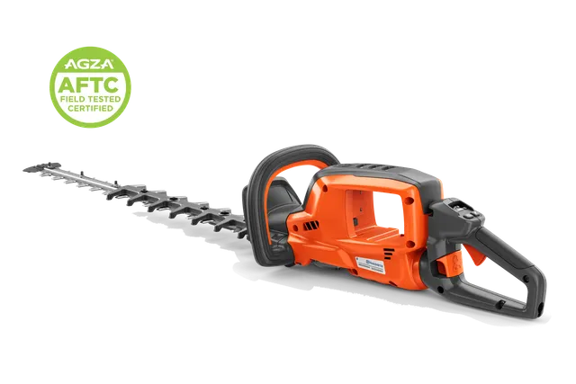 Studio side view of a hedge trimmer with long blade and rear handle; badge shows AGZA AFTC.