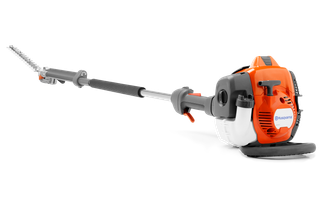 Vue latérale d’un taille-haie Husqvarna à portée étendue.