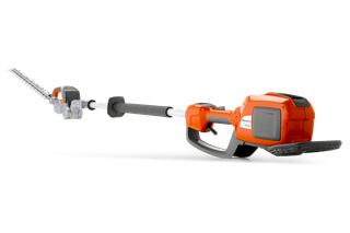 Side view of a Husqvarna battery-powered hedge trimmer with extended reach.