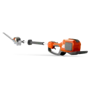 Side view of a Husqvarna battery-powered hedge trimmer with extended reach.