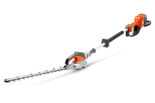 Side view of a Husqvarna hedge trimmer with an extended handle and cutting blade.