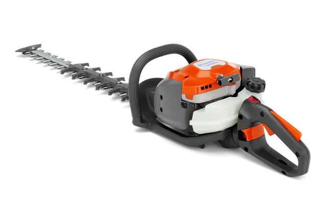 Boční pohled na nůžky na živý plot s ergonomickou rukojetí a řezacím nožem.