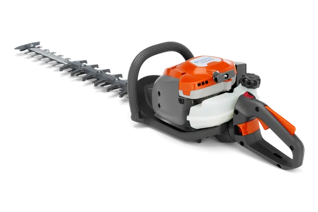 Zijaanzicht van een heggenschaar met ergonomisch handvat en snijmessen.