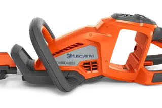 Side view of a Husqvarna Hedge Master hedge trimmer showcasing its ergonomic handle.