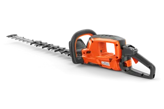 Side view of a Husqvarna hedge trimmer showcasing its ergonomic handle and blade.