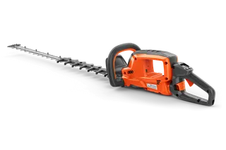 En Husqvarna-häcksax visas från sidan med ergonomiskt handtag och kapskiva.