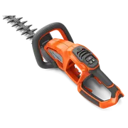 Side view of a Husqvarna hedge trimmer with ergonomic handle and control panel.