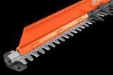 Close-up view of a Husqvarna hedge trimmer blade with protective guard.