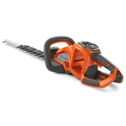 Side view of a Husqvarna hedge trimmer showcasing its ergonomic handle and cutting blades.