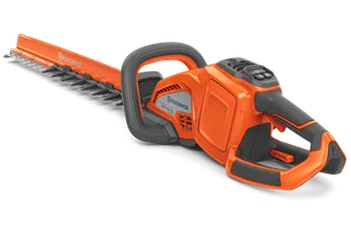 Side view of a Husqvarna hedge trimmer showcasing its ergonomic handle and blade.