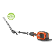 Side view of a Husqvarna battery pole hedge trimmer with telescopic shaft, AGZA AFTC badge.