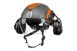 Front view of a Husqvarna safety helmet with ear protection and visor.