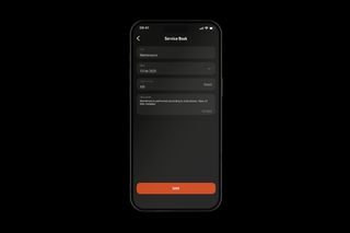 Smartphone screen displaying a service book entry for maintenance with date and hours.