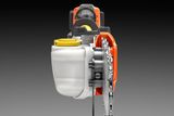 Front view of a chainsaw engine with visible chain and fuel tank.