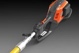 Side view of a Husqvarna battery-powered pole saw.