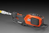 Side view of a battery-powered garden trimmer with an ergonomic handle.