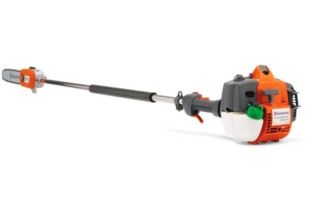 Side view of a Husqvarna pole saw with visible engine and cutting bar.