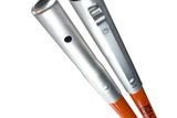 Close-up of two Husqvarna tool handles with attachment points.