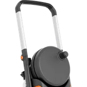 Side view of a Husqvarna pressure washer with wheels and a hose reel.
