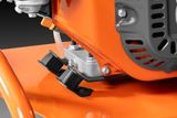 Close-up view of a construction machine's engine mount and components.