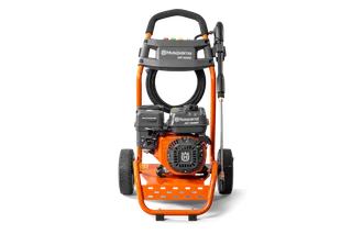 Front view of a Husqvarna pressure washer with visible engine and hose.