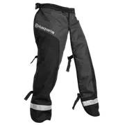 Functional Apron Chainsaw Chaps. Front view of Husqvarna chainsaw protective trousers with reflective bands.