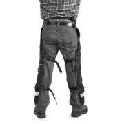 Functional Apron Chainsaw Chaps. Person facing away wearing Husqvarna chainsaw trousers.