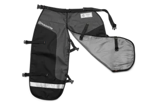 Functional Apron Chainsaw Chaps. Front view of Husqvarna protective leg wear with adjustable straps.