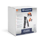 Box of Husqvarna Protective Power Kit Classic with helmet, gloves, and chaps illustrated on the packaging.
