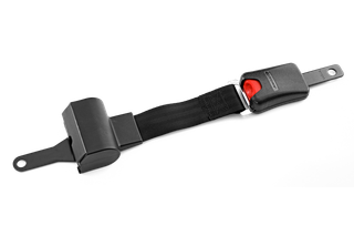 Side view of a seat belt buckle and strap.