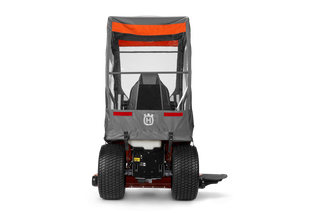 Rear view of a Husqvarna commercial front mower with protective canopy.