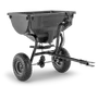 Side view of a garden spreader with two wheels and a hitch attachment.