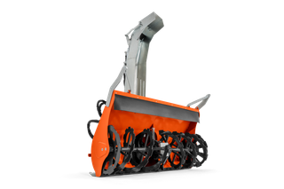 オーガーとシュートを備えた除雪機アタッチメントの正面図。