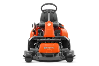 Front view of a Husqvarna ride-on mower showcasing its steering wheel and cutting deck.