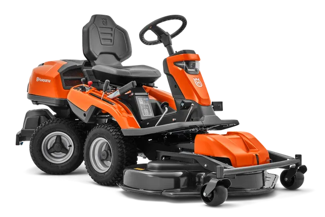 Вид збоку на косарку-трактор Husqvarna з різальною декою.